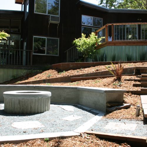 Fire pit, retaining wall, pathways, concrete work,
