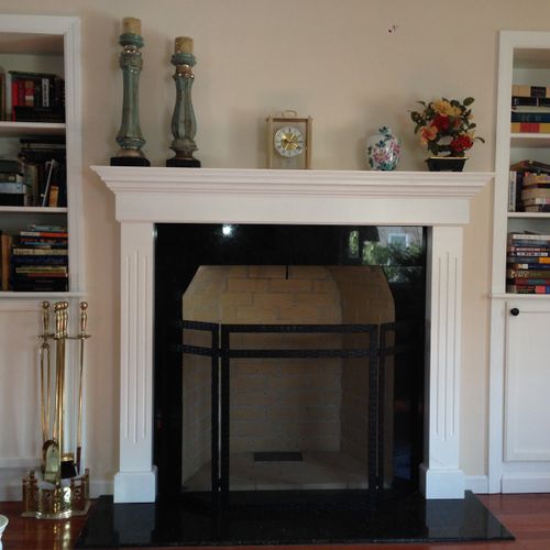 Remodeled fireplace and built in bookcases