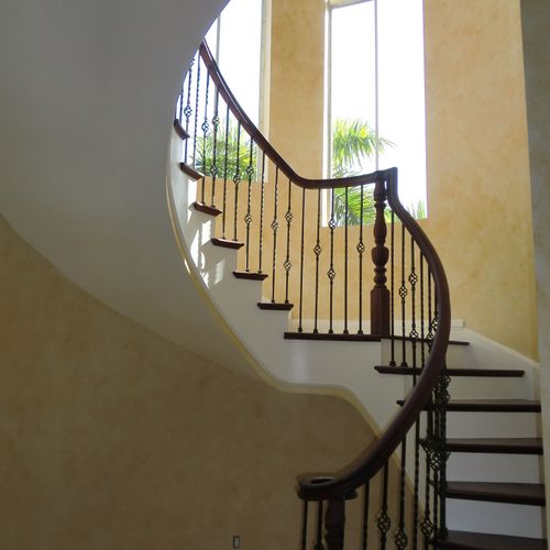Paint and glaze finish in a spiral staircase.
