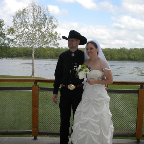This ceremony took place in a facility on a lake i