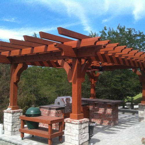 The Pergola, Outdoor Kitchen, and Fire Pit make th