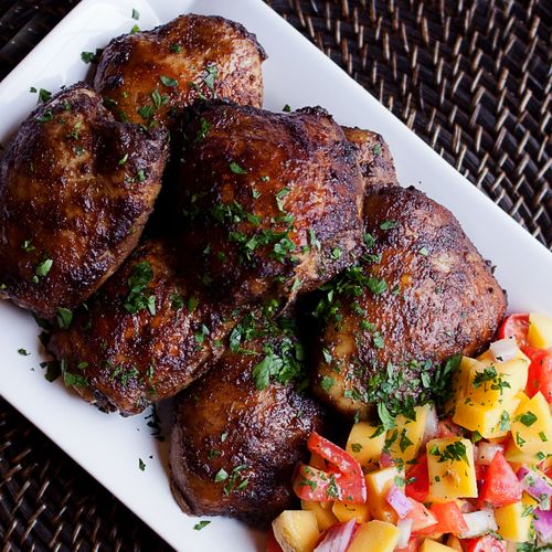 Caribbean Jerk Chicken Thighs served with Mango Sa