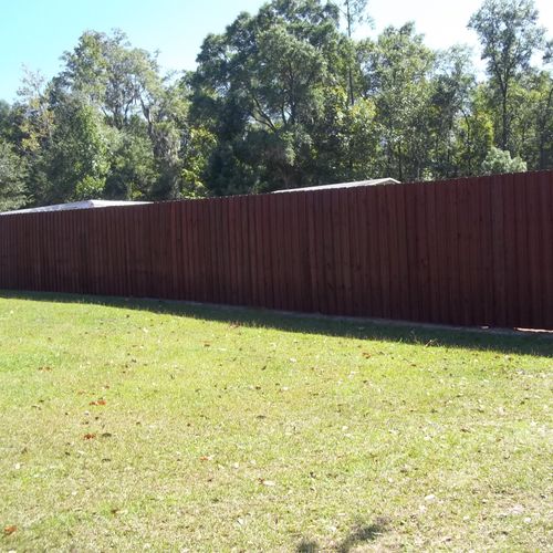 2.5 acre fence, power wash and stain