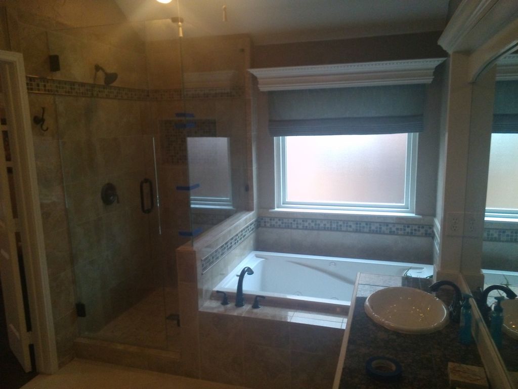 Bathroom Remodel with custom glass inlays, built i