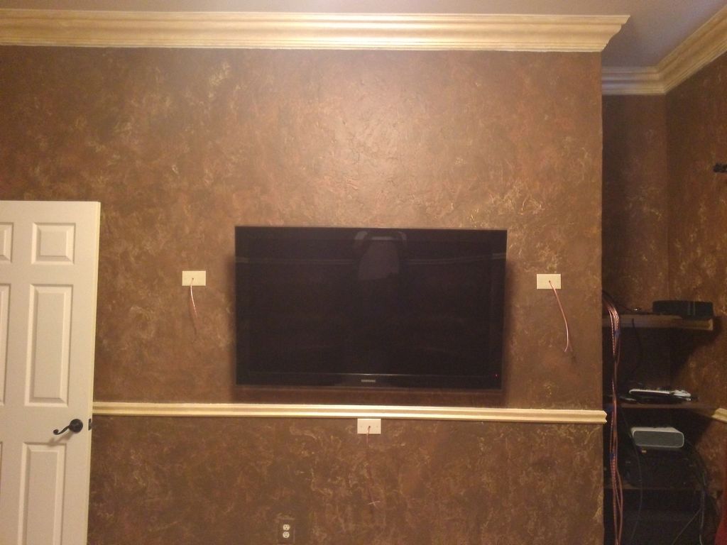 Custom faux crown molding and chair rails, mounted