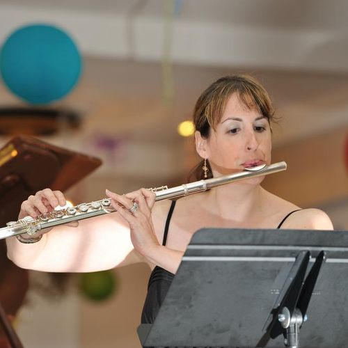 Adult flute student at a our school performance