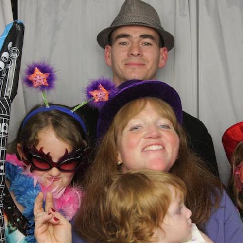 Photo Booth Fun is great at any reception.  Guests