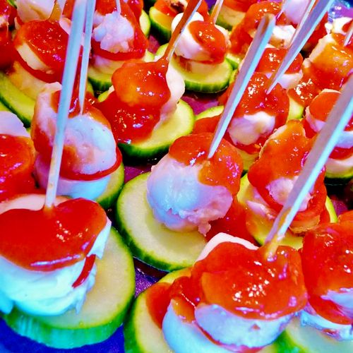 Lobster Pops on a Cucumber Boat.