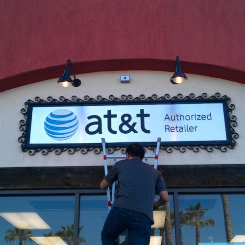Install sign light for AT&T