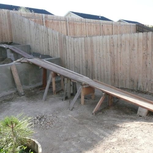 Constructed Scaffolding to wheelbarrow 25 sq. yds.