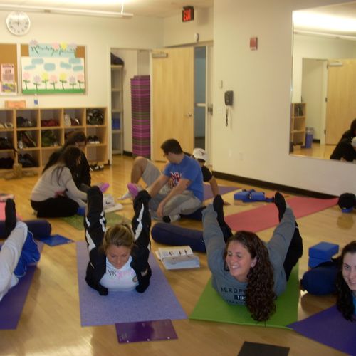 College Yoga Students doing the Bow