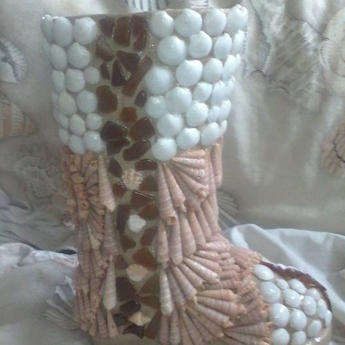 creative image of boot made from collective SEASHE