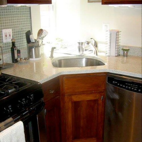Icestone Countertop. Sink moved to corner to creat