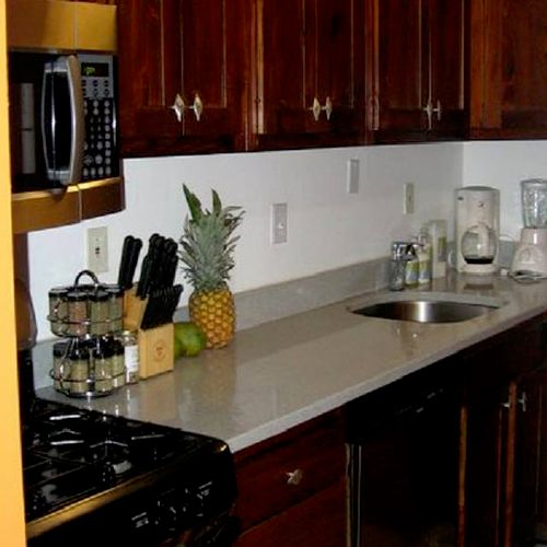 Recycled Glass Countertops
FSC Pine Cabinets
Non-T