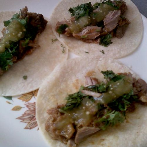 Carnitas tacos with cilantro and green chili