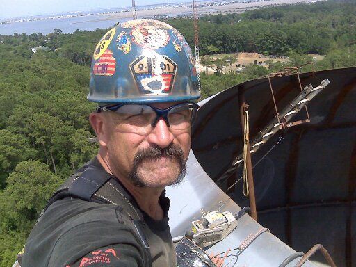 Me, getting ready to hang roof fingers on top of S