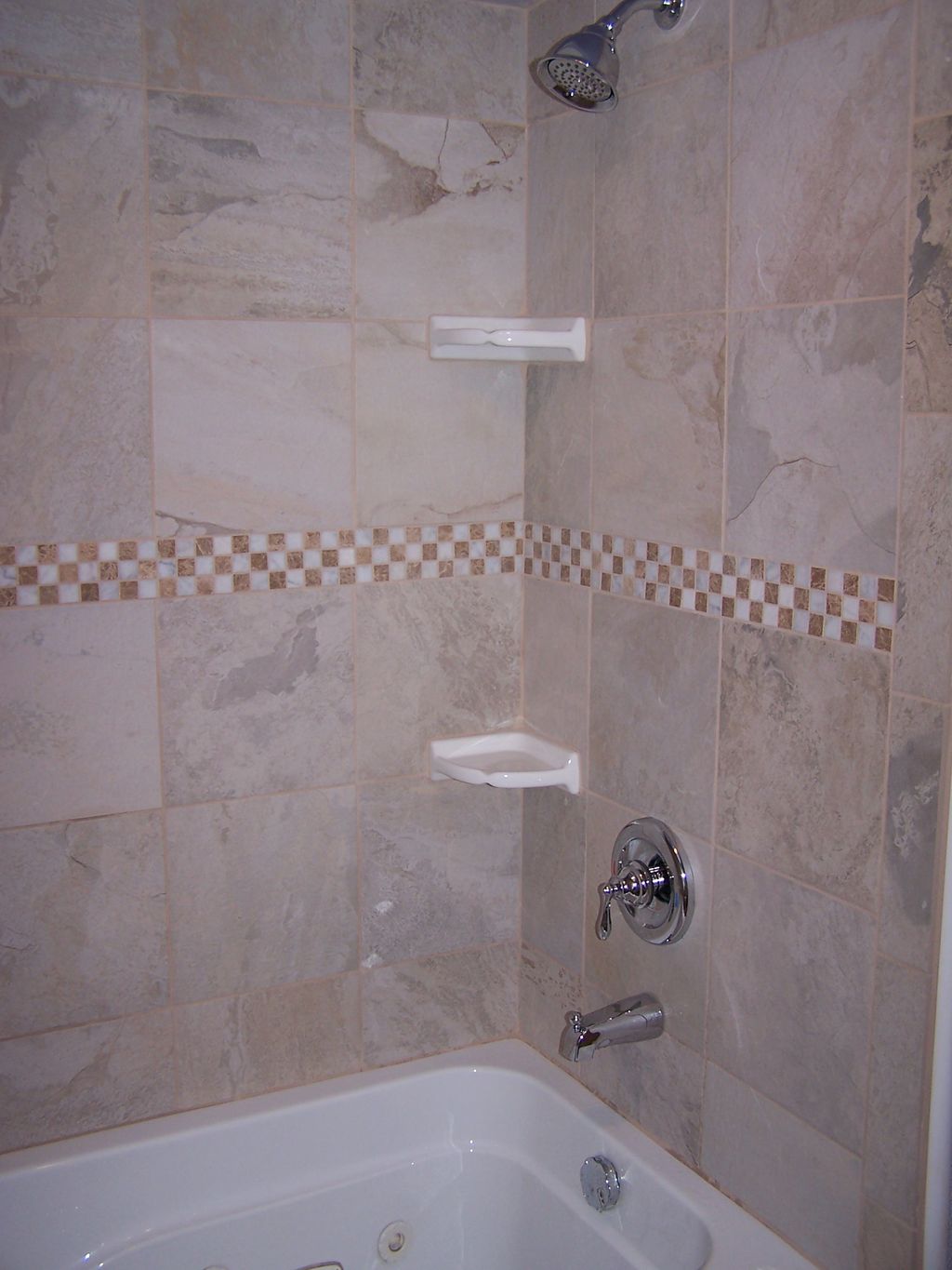This is a custom shower surround installed over a 