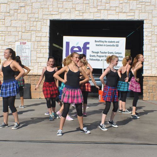 Company performing at a car wash in early 2010's