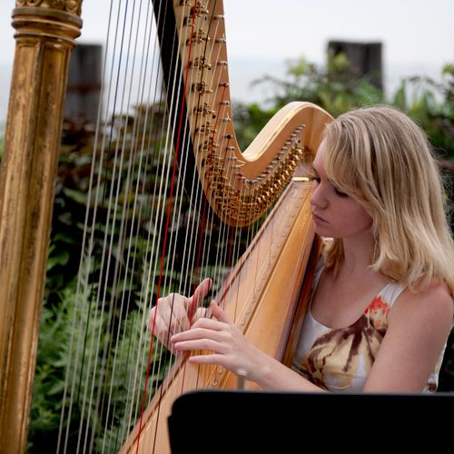 Harpist- Nice touch to any wedding!