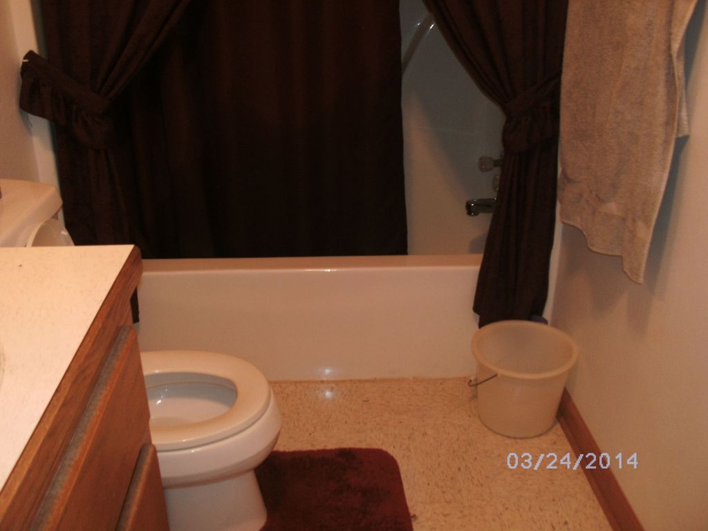 Clean and shiny bathroom after thorough scrubbing.