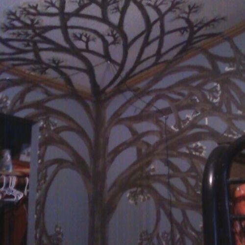 tree painting from bottom of wall by floor all the