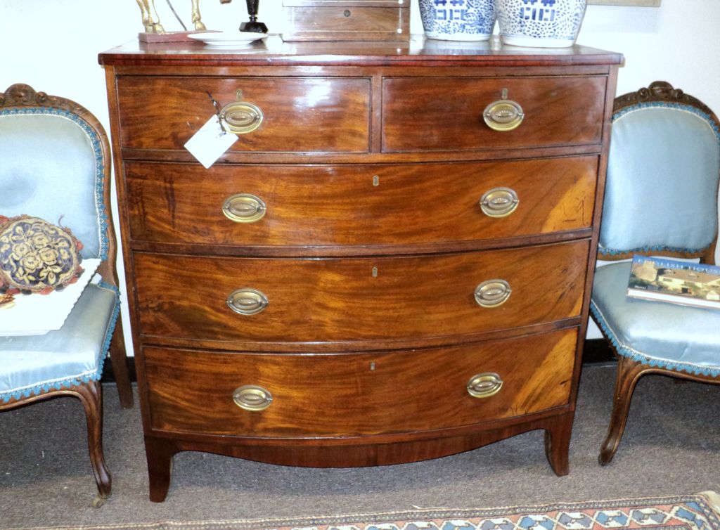 Traditional English Georgian chest flanked by peti