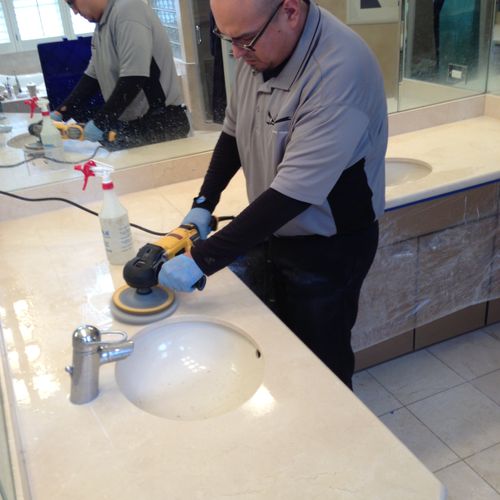 CSI Clean Team resurfacing a marble countertop