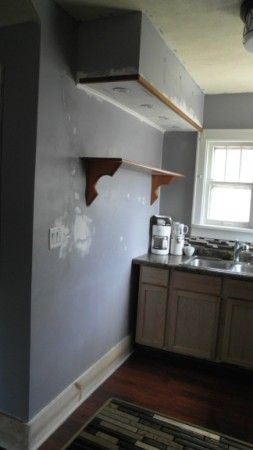 The kitchen wall cabinets were initially on the no