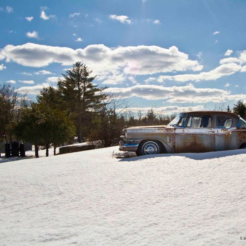 Classic car in the Maine winter snow