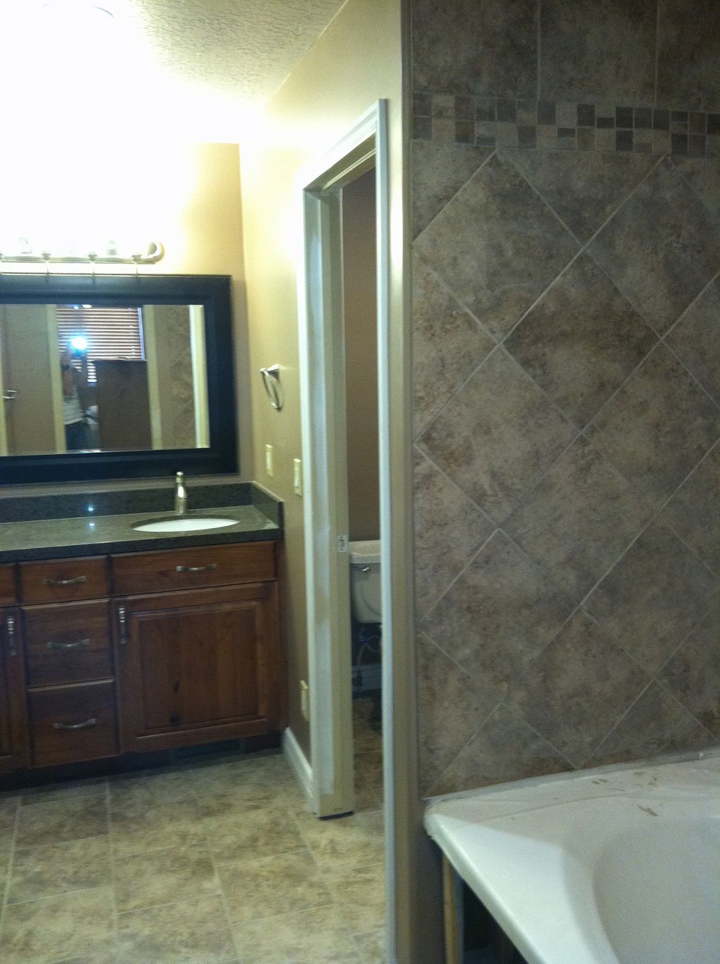 Completed full gut and replace of bathroom in West