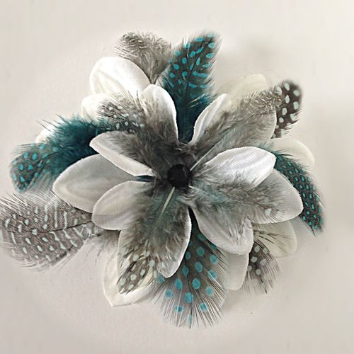 White flower with dyed Turquoise and black quail f