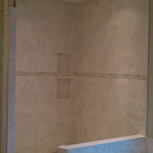 White Travertine custom shower with recessed shelv