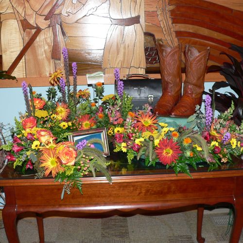Funeral flowers, around my clients urn, his lunch 