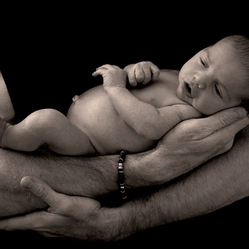 Two weeks Old, safe in his Father's arms - Awarded