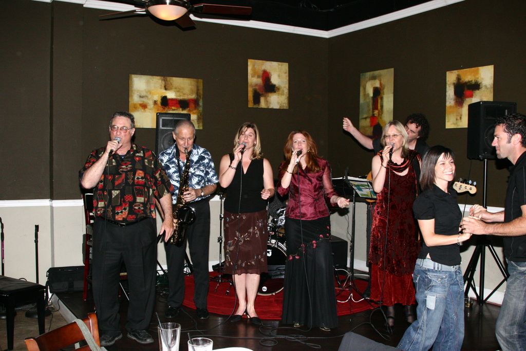 Vocal Jazz ensemble performing at a local nightclu