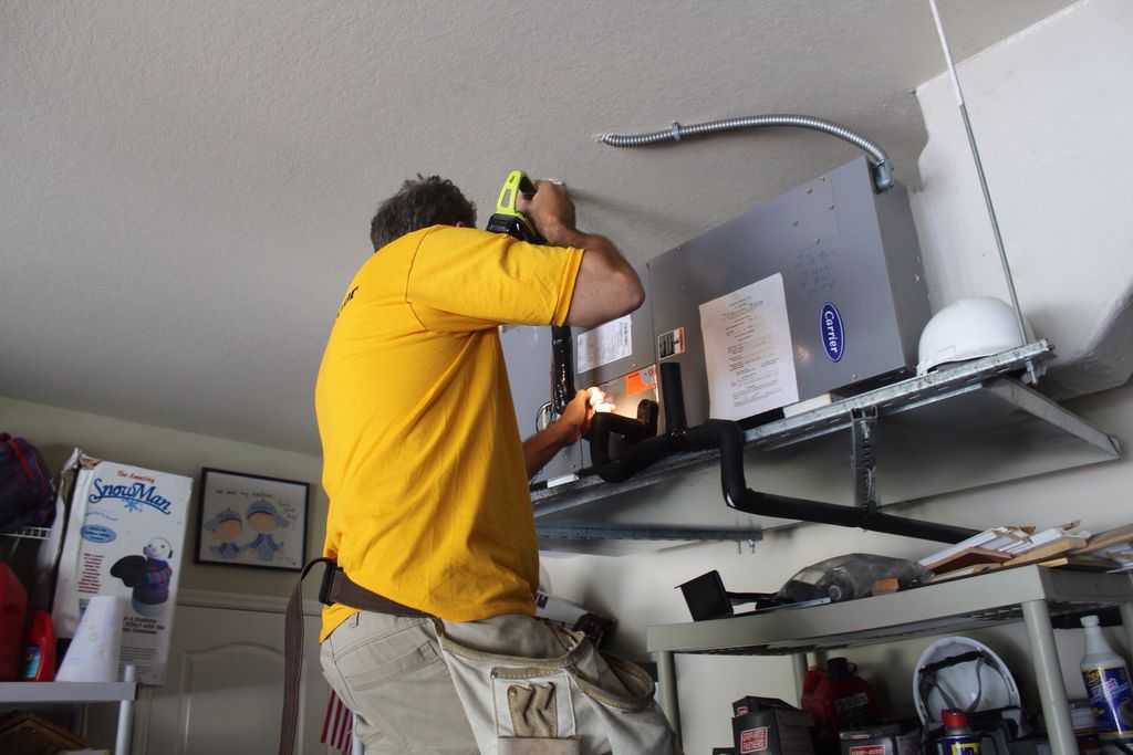 Inspecting the Air Conditioning unit.
