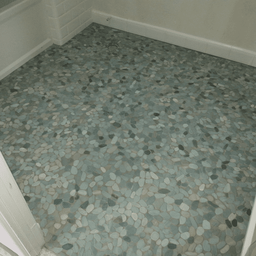 hand laid pebble bathroom floor