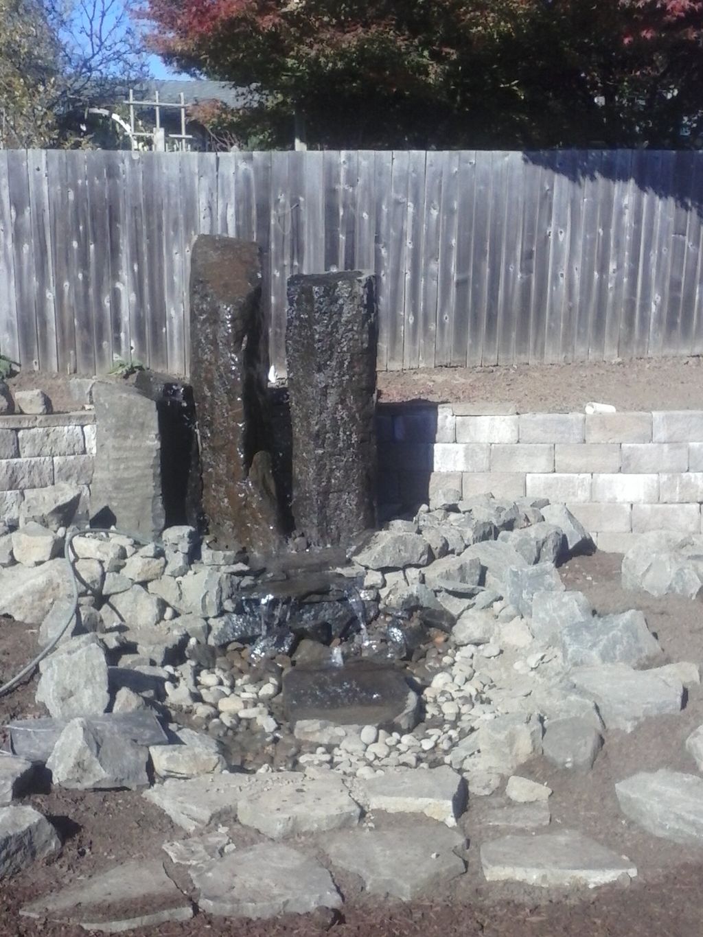Large retaining wall with waterfeature
