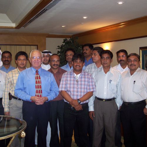 Ken training a group of business managers in Dubai