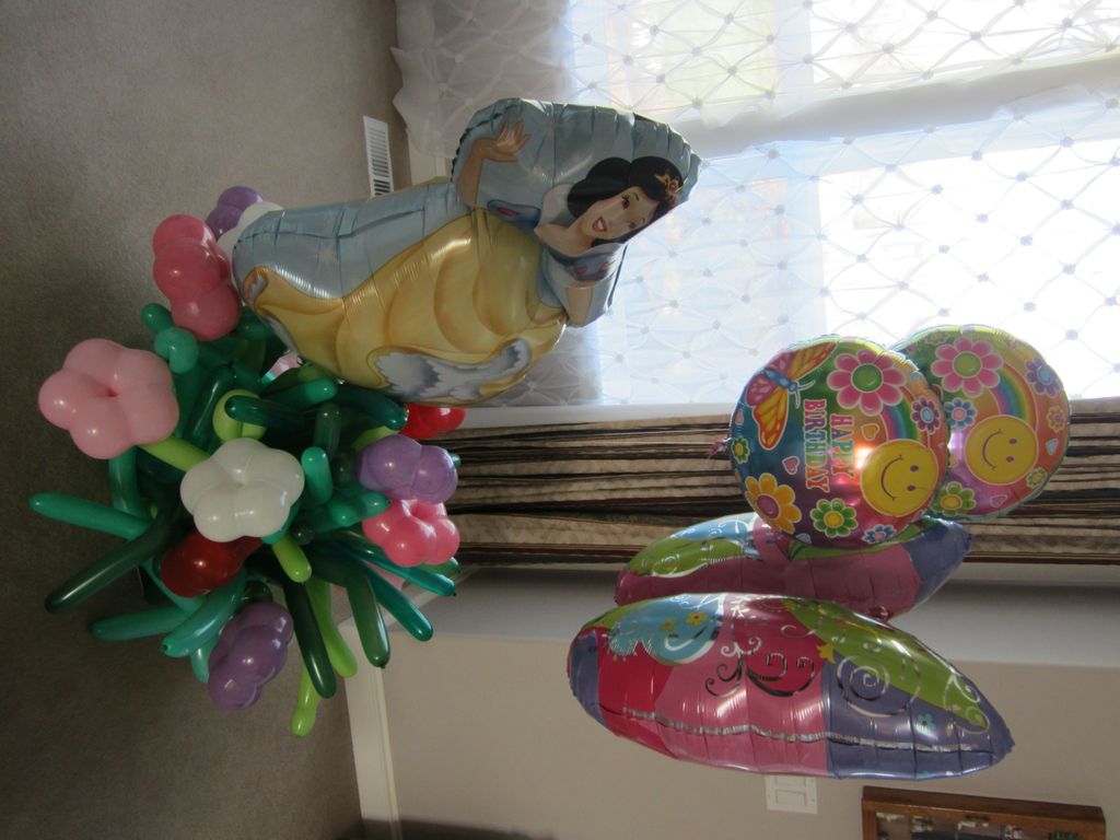 Snow while in a field of flowers for a Birthday Ga