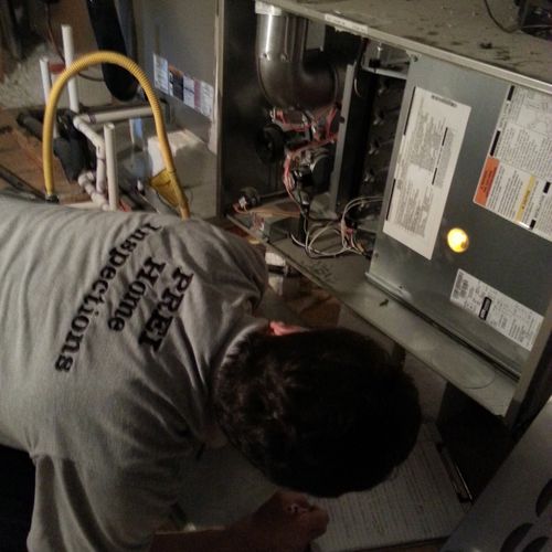 Inspecting the Heating and Cooling System(HVAC) in