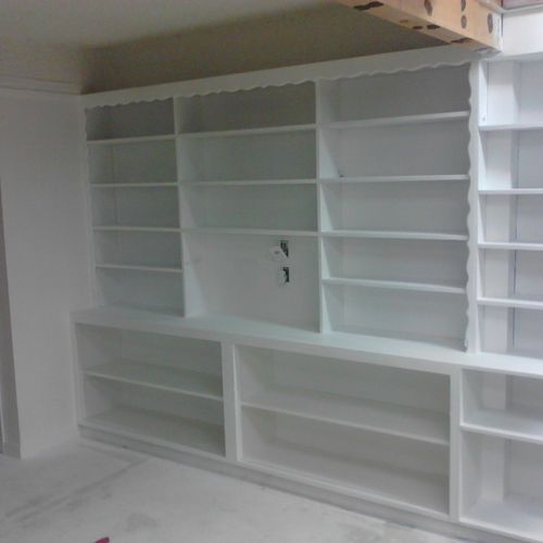 Wood panel bookshelf after