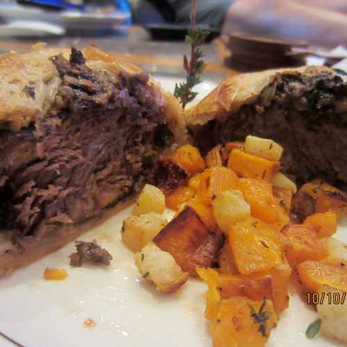 home made puff pastry beef wellington with roasted