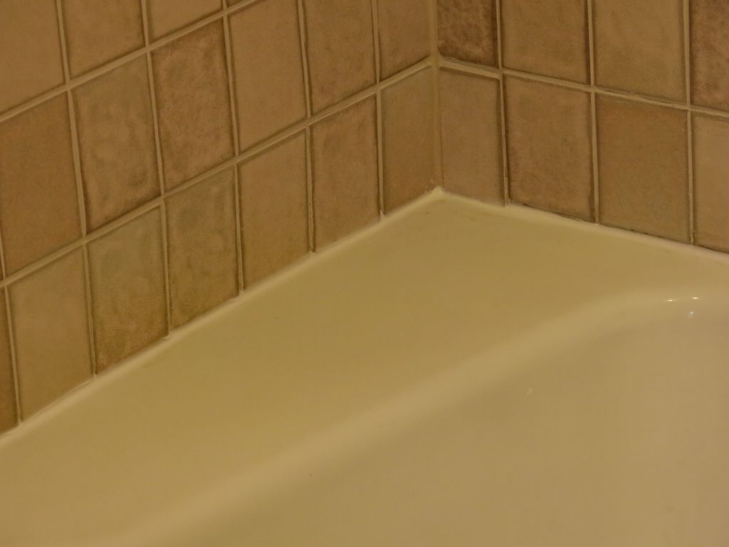 After- Wall was reinforced, tiles re-attached, reg