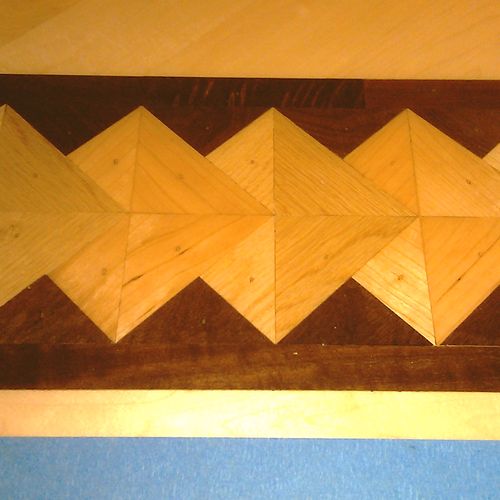 custom hardwood inlays cut by hand