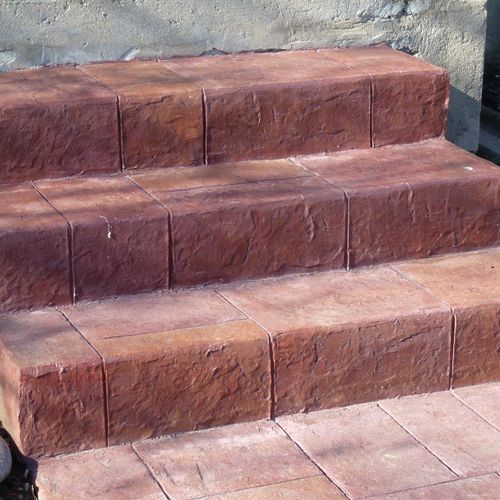 Front steps stamped with notched ashlar pattern an