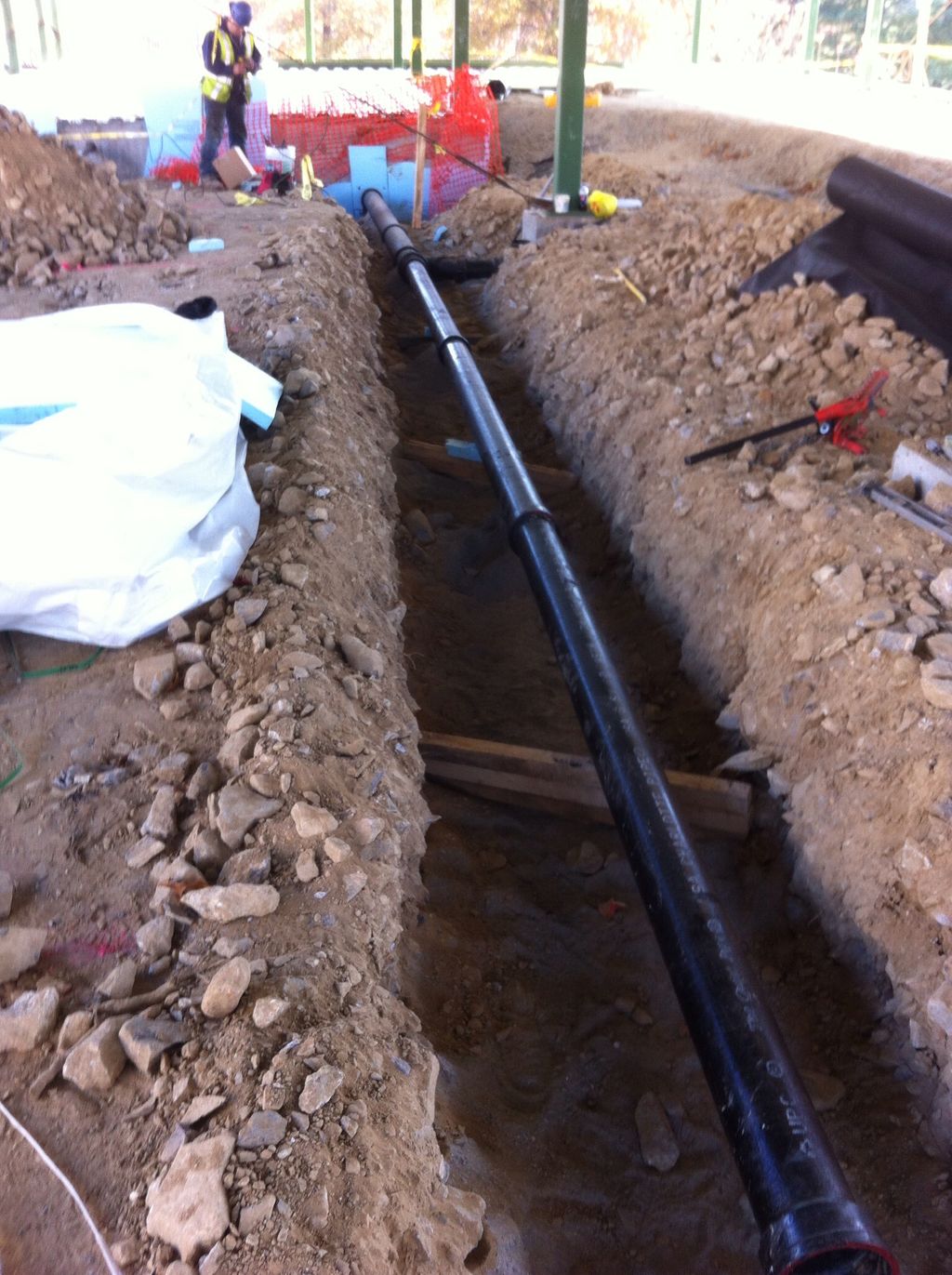 From bottom drain pipe.