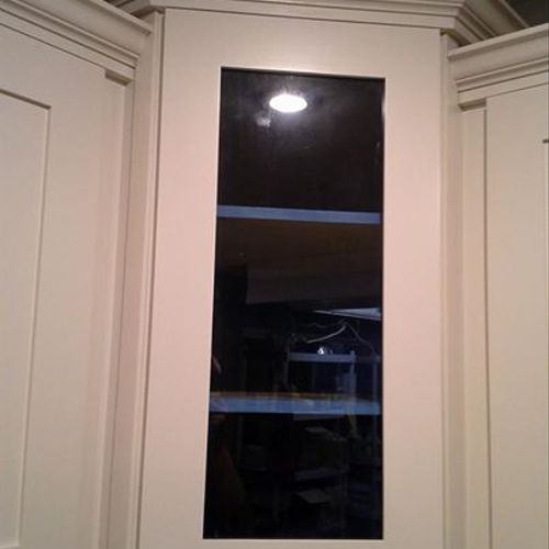 Cabinet install with crown molding.