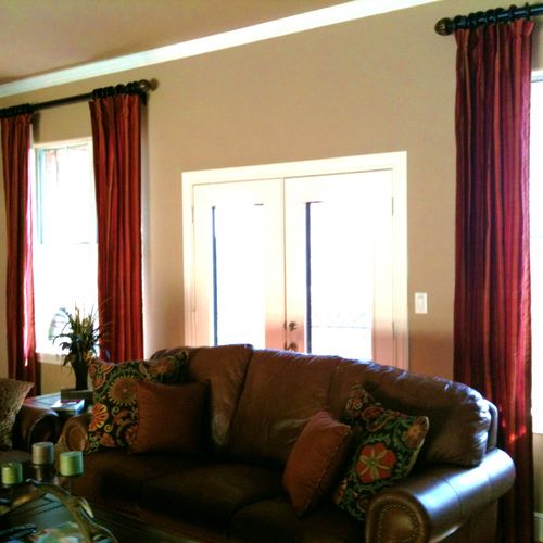 These custom draperies have a wide vertical stripe