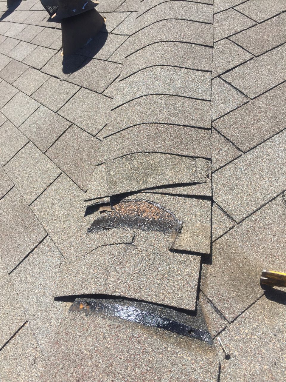 Roofing- Wind damaged shingles- before.